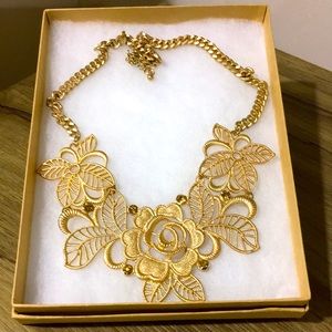 Gold tone Metal flower necklace